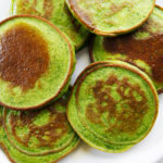 Green pancakes with a bunch of spinach and no added sugar